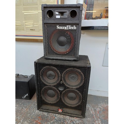 695 - Two speakers, one Peavey 410 TXF 4 x 10