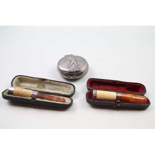 2283 - Three .925 sterling tobacciana items to include snuff box, amber cheroot etc. - approx. gross weight... 