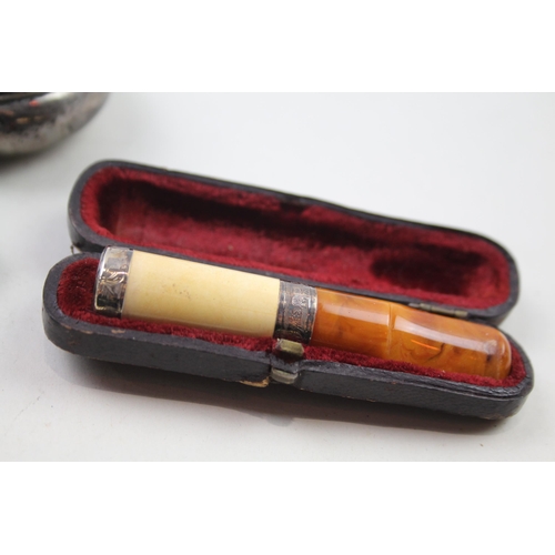 2283 - Three .925 sterling tobacciana items to include snuff box, amber cheroot etc. - approx. gross weight... 