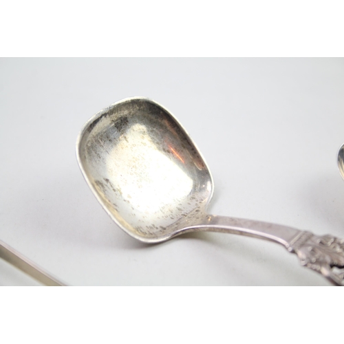 2285 - Three hallmarked silver condiment spoons, two .830 and one .925 - approx. gross weight 54g