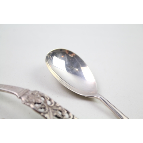 2285 - Three hallmarked silver condiment spoons, two .830 and one .925 - approx. gross weight 54g