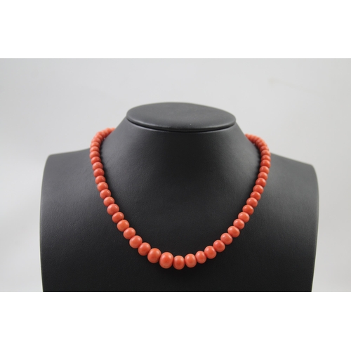 2440 - A coral bead necklace with silver clasp - approx. gross weight 31g