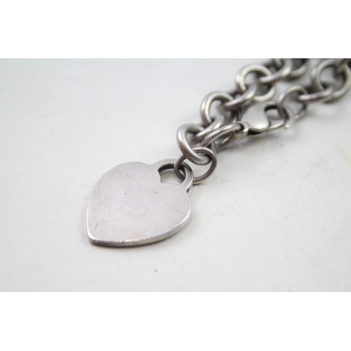 2447 - A Tiffany & Co. .925 silver heart shaped pendant bracelet - approx. gross weight 34g