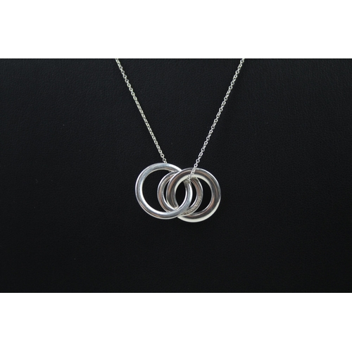 2448 - A Tiffany & Co. silver interlocking pendant necklace - approx. gross weight 5g