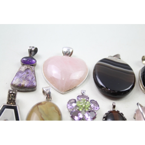 2452 - A collection of silver gemstone set pendants - approx. gross weight 175g