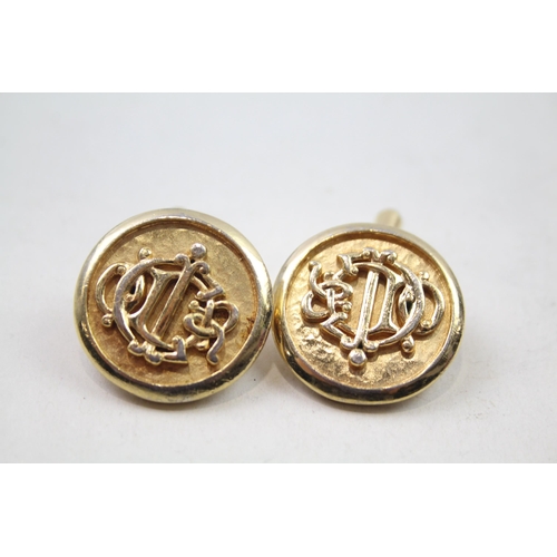 2460 - A pair of Christian Dior yellow metal cufflinks - approx. gross weight 19g