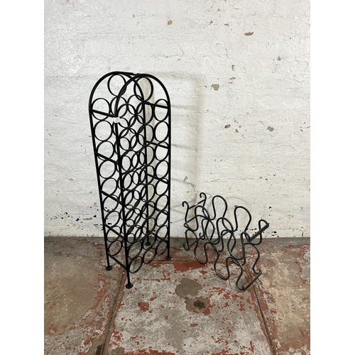 48 - Two modern wrought metal bottle racks - largest approx. 109cm high x 32cm wide