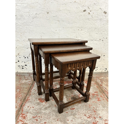 70 - A carved oak nest of tables