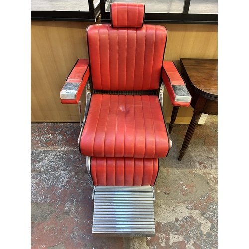 72 - A red leatherette and chrome plated adjustable swivel barber's chair