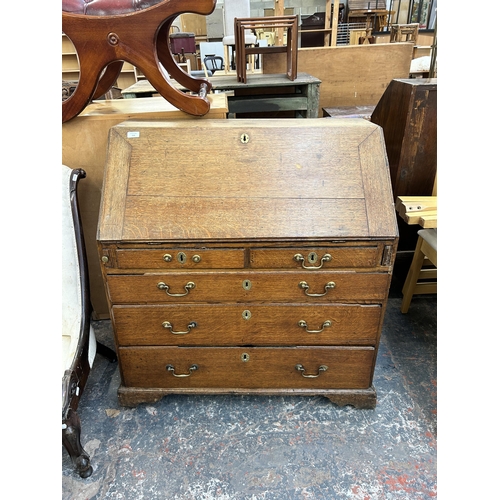 239 - A George III oak bureau