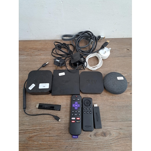 708 - A collection of AV related items to include two Apple TVs, one A1427 and one A1625; Amazon Fire TV s... 