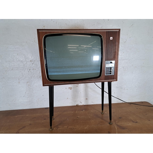 719 - An early 1970s teak cased Rank Organisation Bush TV195V superheterodyne 625 line 20