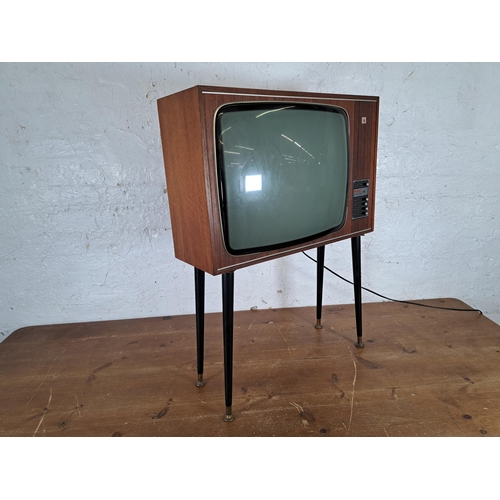 719 - An early 1970s teak cased Rank Organisation Bush TV195V superheterodyne 625 line 20