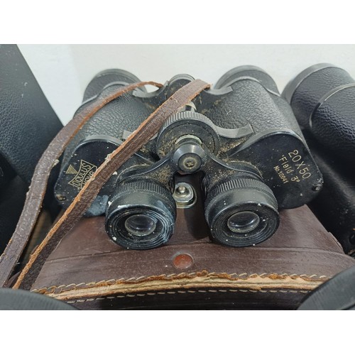 586 - Seven pairs of binoculars to include Selfridges 8 x 30, Wray Wrayvu 8 x 30, Tasco 12 x 50, Oculus 20... 