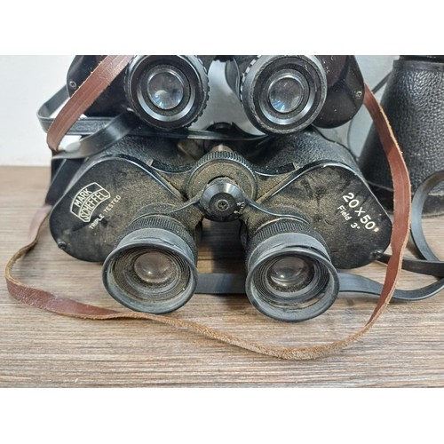 588 - Five pairs of binoculars to include Paralux 8 x 30, Mark Scheffel 20 x 50, Swallow Luxe 12 x 60 (A/F... 