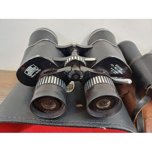 590 - Four pairs of binoculars, Lieberman & Gortz 21 x 47,  Mark Scheffel 10-30 x 50 zoom, Kershaw The Mon... 