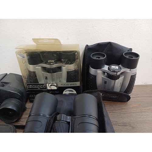 591 - A collection of pocket binoculars to include Summit, Executive etc.