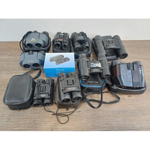 592 - Nine pairs of pocket binoculars, two Pentax, three Praktica, two Minolta, one Tasco and one Vivitar