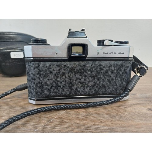 601 - A cased Asahi Pentax Spotmatic SP II 35mm SLR camera fitted with Takumar Super-Multi-Coated 1:1.8/55... 