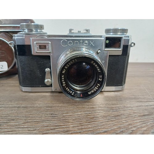 602 - A cased 1951 Zeiss Ikon Contax IIa 35mm rangefinder camera fitted with Zeiss-Opton Sonnar 1:2 f=50mm... 