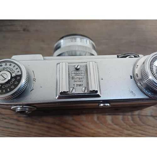 602 - A cased 1951 Zeiss Ikon Contax IIa 35mm rangefinder camera fitted with Zeiss-Opton Sonnar 1:2 f=50mm... 