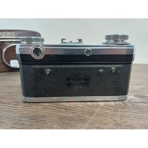 602 - A cased 1951 Zeiss Ikon Contax IIa 35mm rangefinder camera fitted with Zeiss-Opton Sonnar 1:2 f=50mm... 