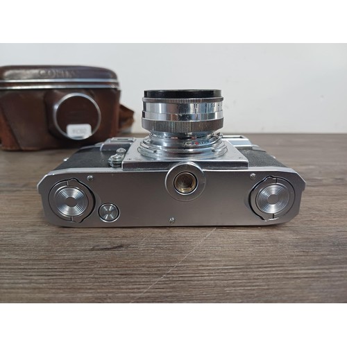 602 - A cased 1951 Zeiss Ikon Contax IIa 35mm rangefinder camera fitted with Zeiss-Opton Sonnar 1:2 f=50mm... 