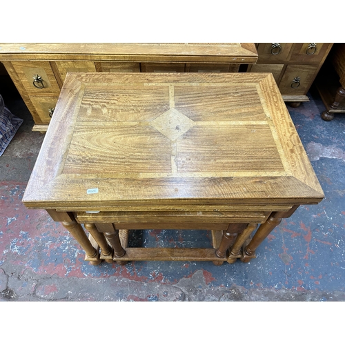 106 - A Barker & Stonehouse Flagstone mango wood nest of tables - approx. 57cm high x 70cm wide x 50cm dee... 