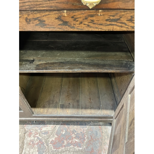 112 - A George III oak sideboard - approx. 98cm high x 168cm wide x 52cm deep