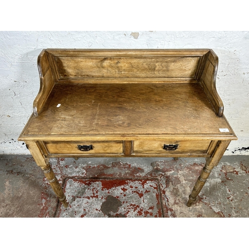 119 - A Victorian pine two drawer wash stand - approx. 93cm high x 93cm wide x 46cm deep