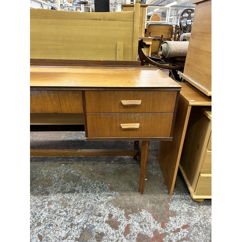 123 - A mid 20th century Gimson & Slater Ltd Vesper Furniture teak dressing table - approx. 77cm high x 15... 