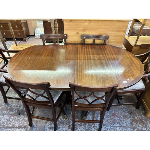 128 - A Bevan Funnell mahogany extending dining table and six chairs