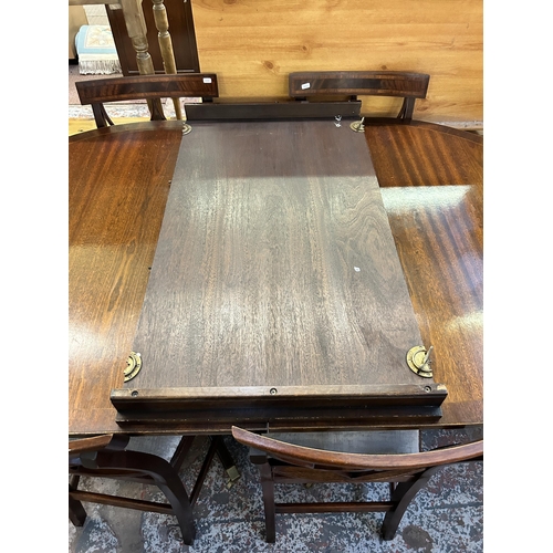 128 - A Bevan Funnell mahogany extending dining table and six chairs