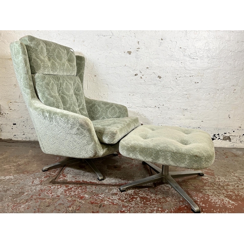 132 - A mid 20th century green floral fabric upholstered swivel armchair and stool