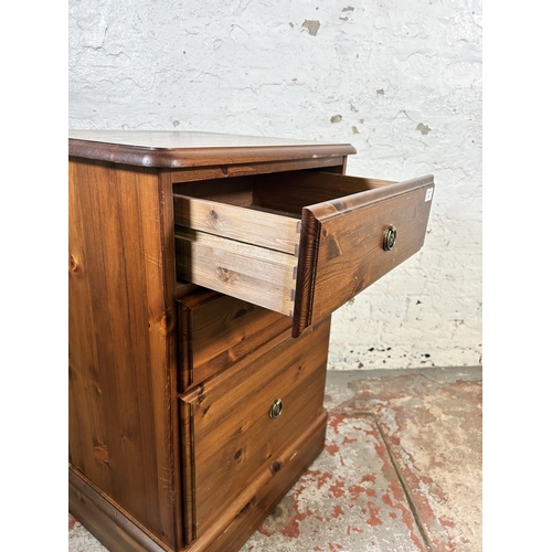 144 - A Ducal pine three drawer office filing cabinet