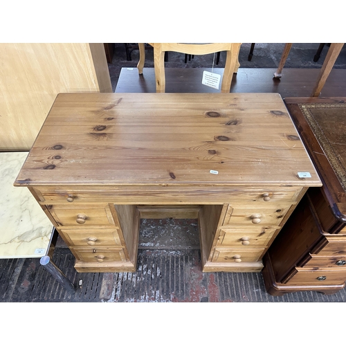146 - A Victorian style pine kneehole desk - approx. 77cm high x 97cm wide x 50cm deep