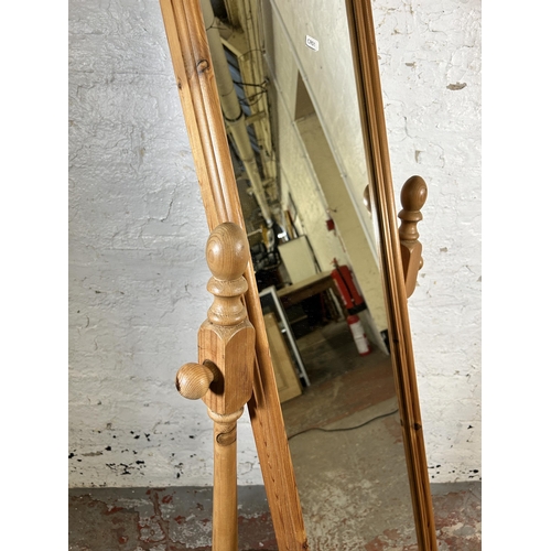 147 - A Victorian style pine cheval mirror - approx. 165cm high x 60cm wide x 36cm deep