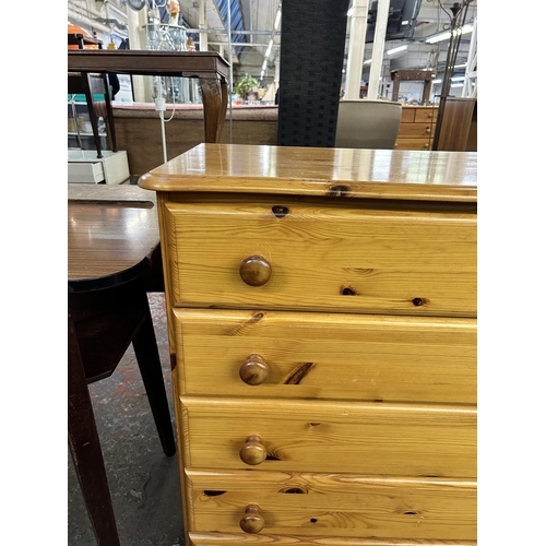 159 - A modern pine chest of drawers - approx. 91cm high x 86cm wide x 43cm deep