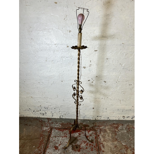 162 - A wrought metal standard lamp - approx. 160cm high