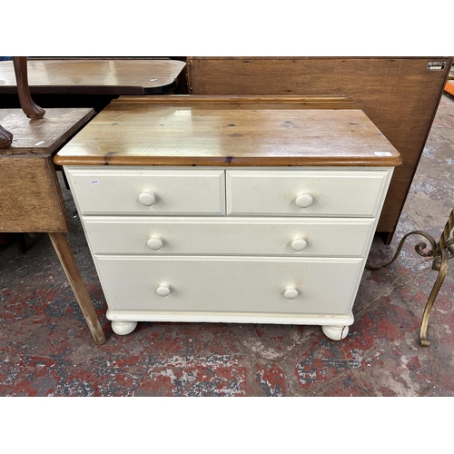 164 - A Ducal Victoria pine and white painted chest of drawers - approx. 74cm high x 86cm wide x 45cm deep