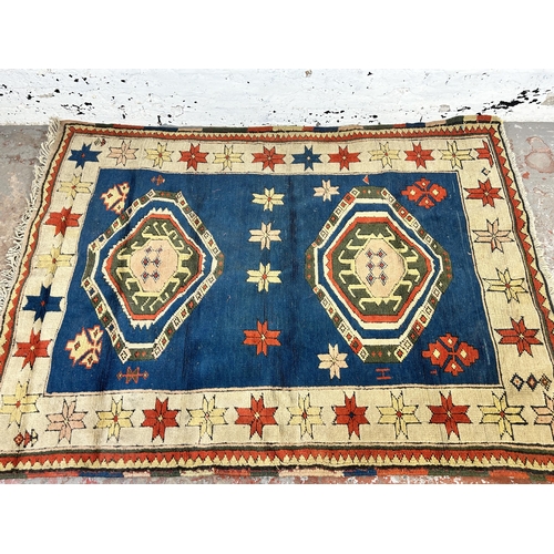 178 - A mid 20th century hand knotted rug - approx. 180cm x 130cm