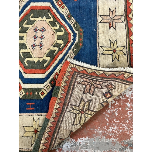 178 - A mid 20th century hand knotted rug - approx. 180cm x 130cm