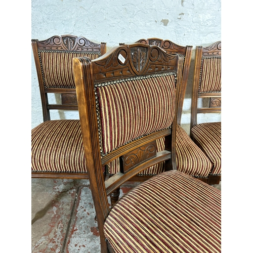 192 - Four Edwardian carved mahogany and fabric upholstered dining chairs