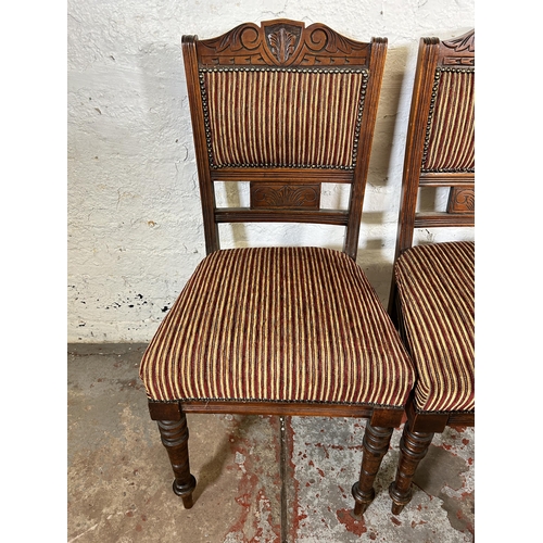 192 - Four Edwardian carved mahogany and fabric upholstered dining chairs