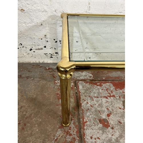 196 - A brass and bevelled glass coffee table