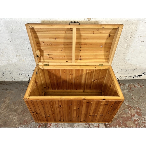 203 - A pine dome top blanket box - approx. 62cm high x 94cm wide x 49cm deep