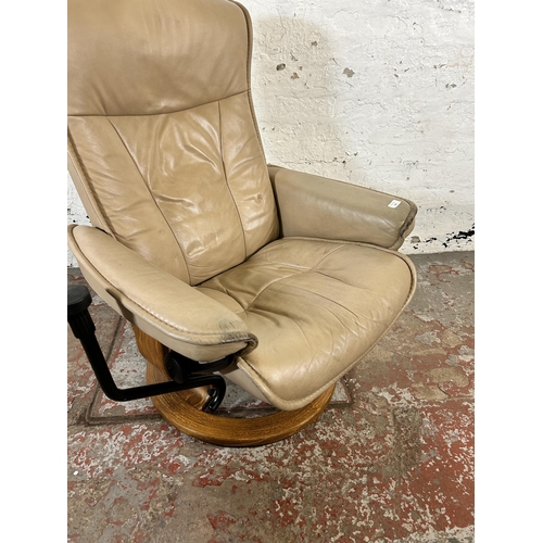 204 - An Ekornes Stressless beige leather swivel reclining armchair