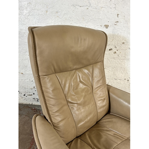 204 - An Ekornes Stressless beige leather swivel reclining armchair