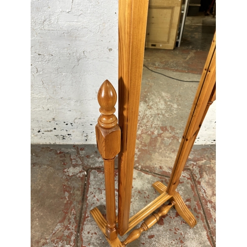 207 - A pine cheval mirror - approx. 146cm high