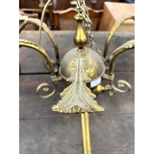 208 - A pair of 19th century style brass six branch chandeliers with acanthus leaf design - approx. 120cm ... 